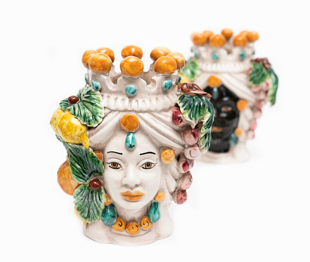 Coppia teste di moro in ceramica siciliana di Caltagirone h20cm art. uva