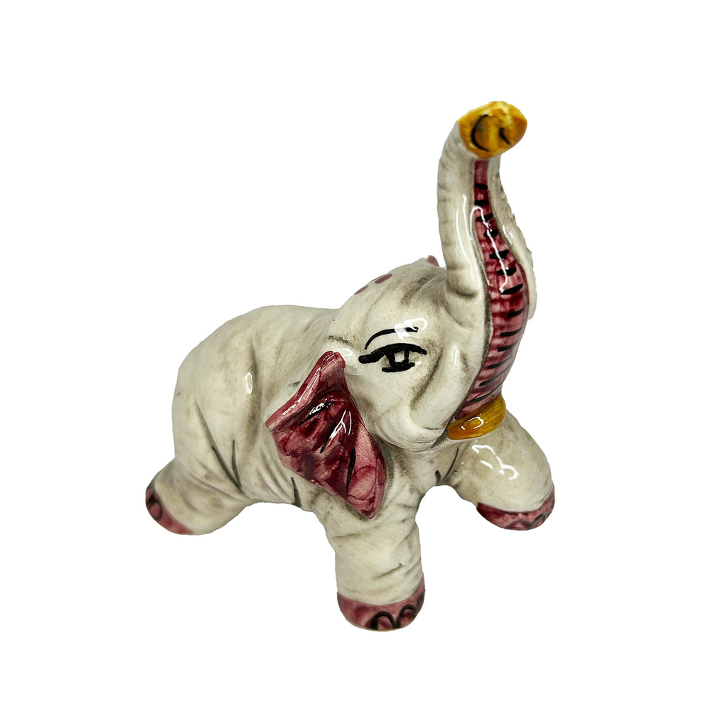 Elefante in ceramica di Caltagione realizzato a mano, animali portafortuna art. piede su amaranto