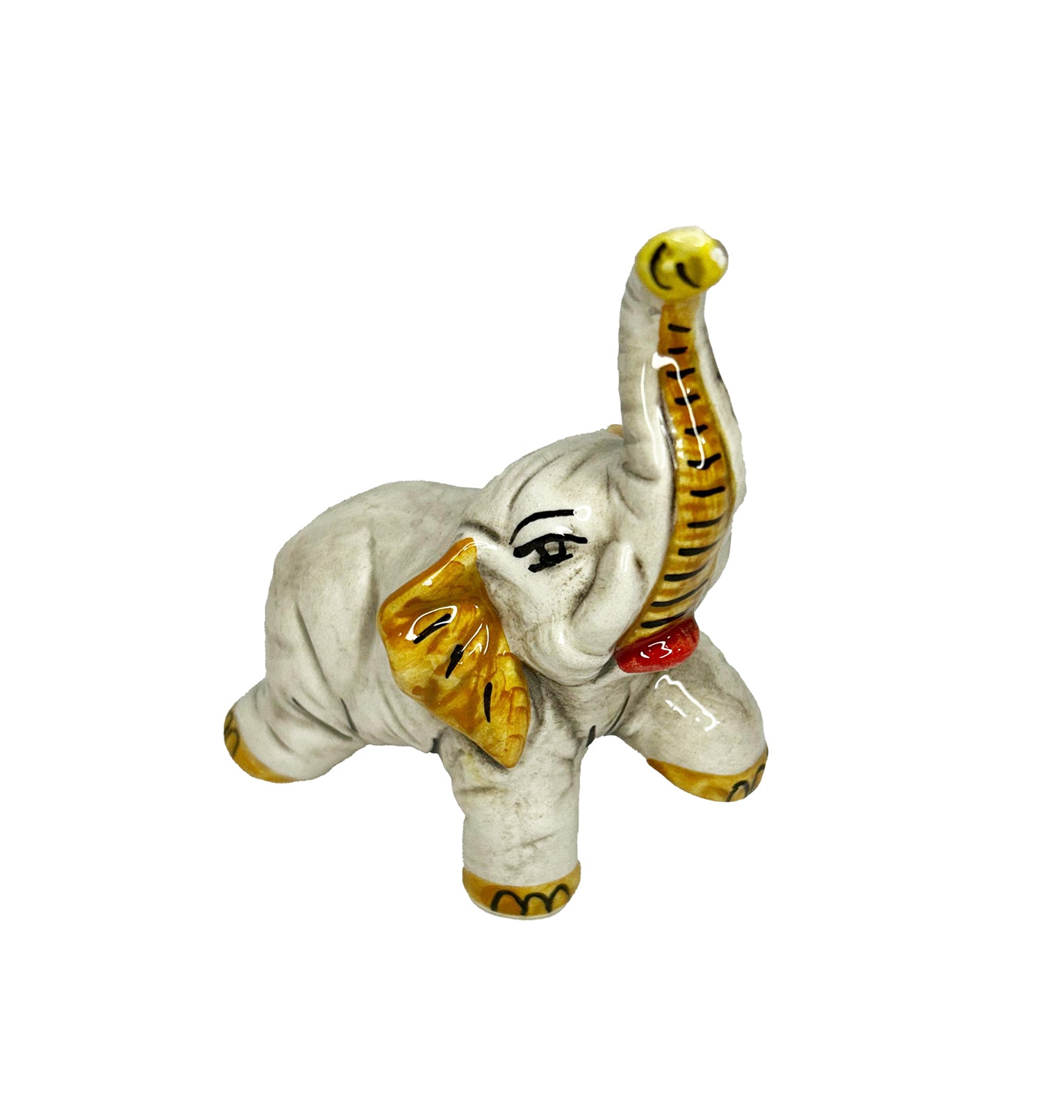 Elefante in ceramica di Caltagione realizzato a mano, animali portafortuna art. piede su giallo