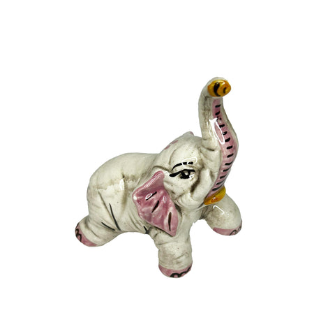 Elefante in ceramica di Caltagione realizzato a mano, animali portafortuna art. piede su rosa