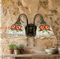 Applique da parete a 2 luci in ferro battuto e ceramica siciliana realizzato e decorato artigianalmente a mano art. melograno