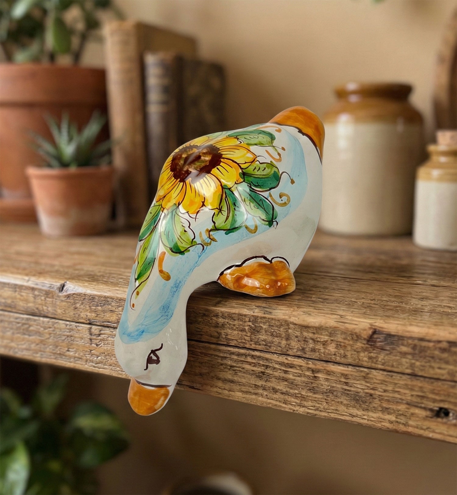 Papera in ceramica siciliana di santo stefano di camastra realizzata e decorata totalmente a mano girasole