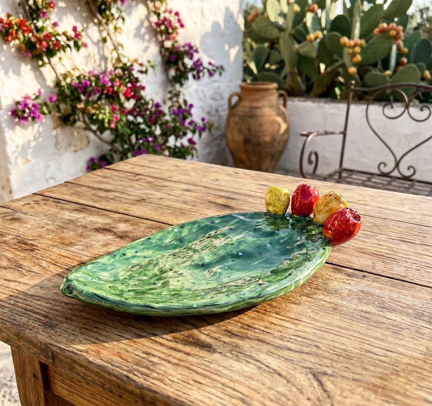 Svuota tasche pala ficodindia in ceramica siciliana di Caltagirone decorata a mano