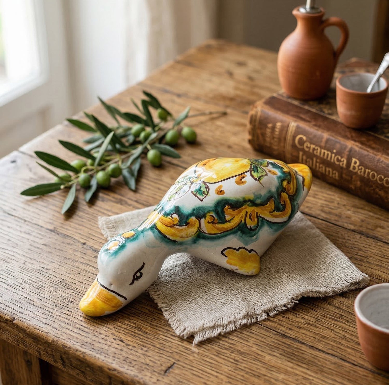 Papera in ceramica siciliana di santo stefano di camastra realizzata e decorata totalmente a mano limoni