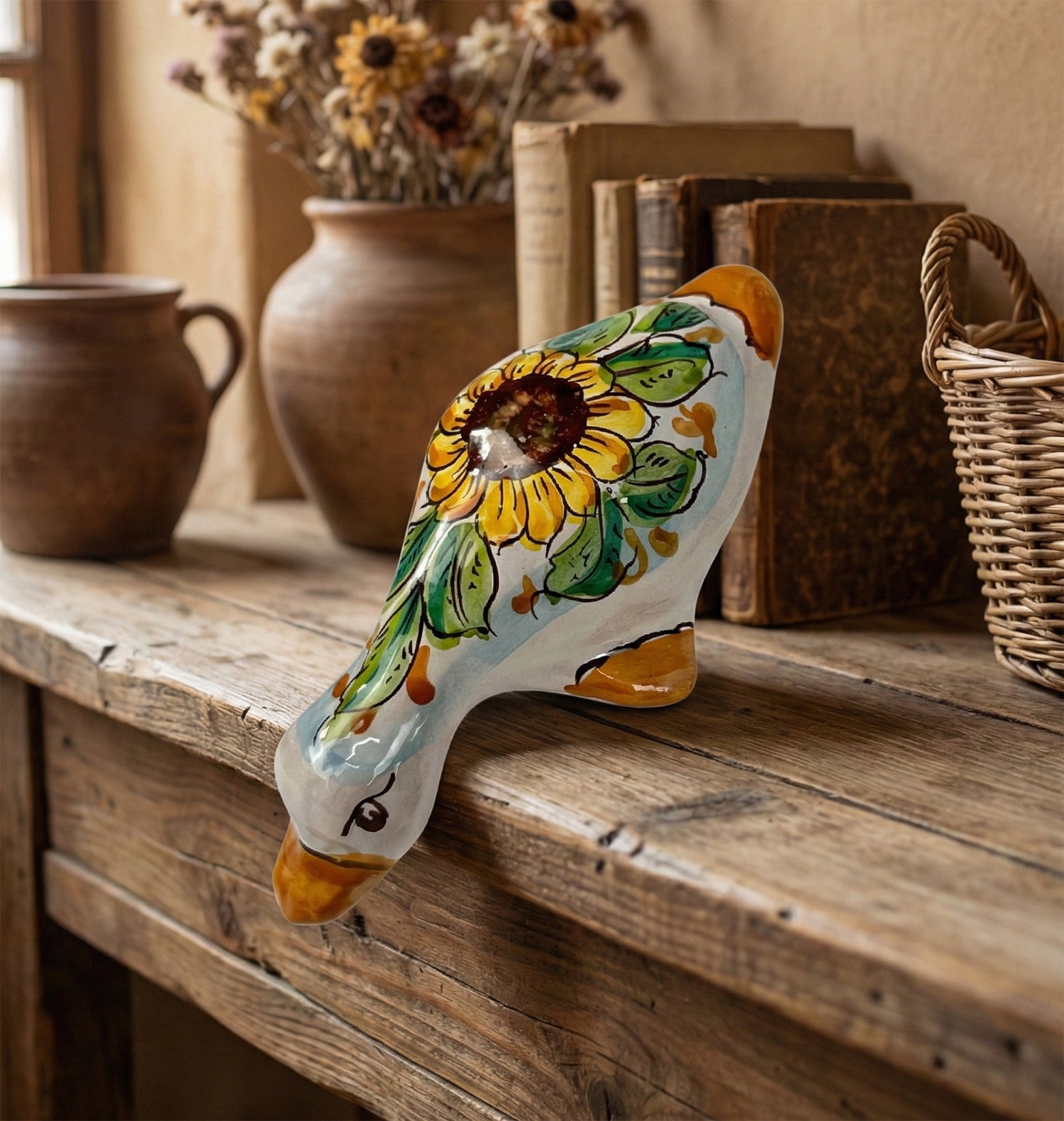 Papera in ceramica siciliana di santo stefano di camastra realizzata e decorata totalmente a mano girasole