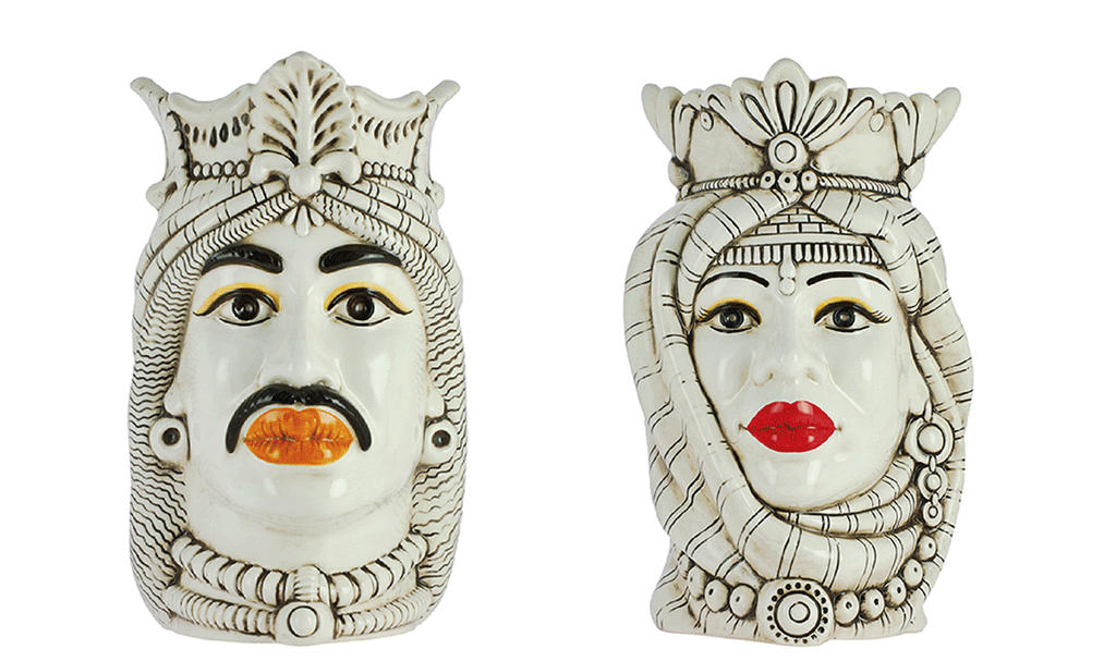 Pair of smoky Arab Moorish heads in hand-decorated Nicaraguan ceramic art. 801,800